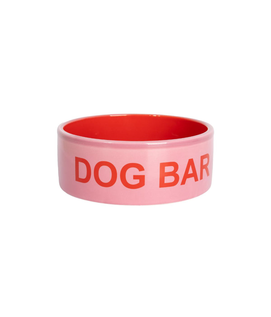 Ciotola Dog Bar rosa con interno rosso e scritta rossa "DOG BAR".